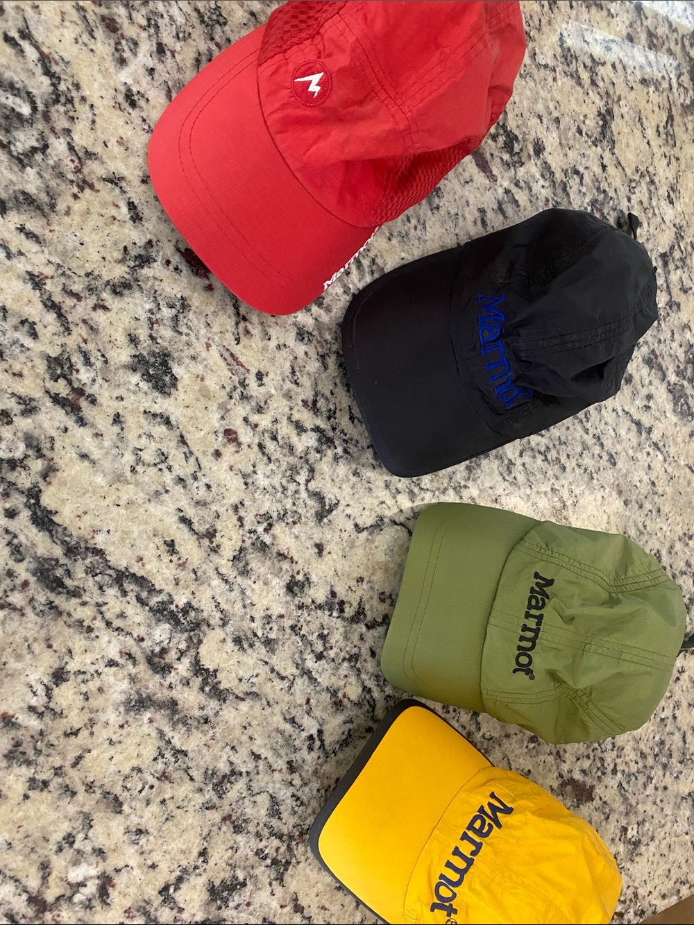 Marmot pre cip Four-Pack Logo Caps in Red, Black, Olive, and Yellow